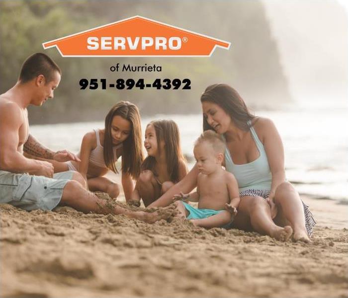 A family is shown having a family vacation at the beach.