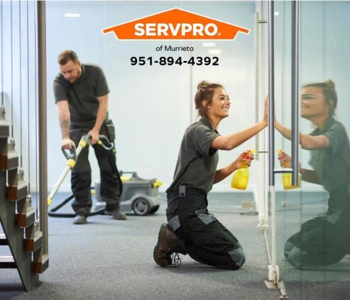 A team of professionals cleans a commercial property.